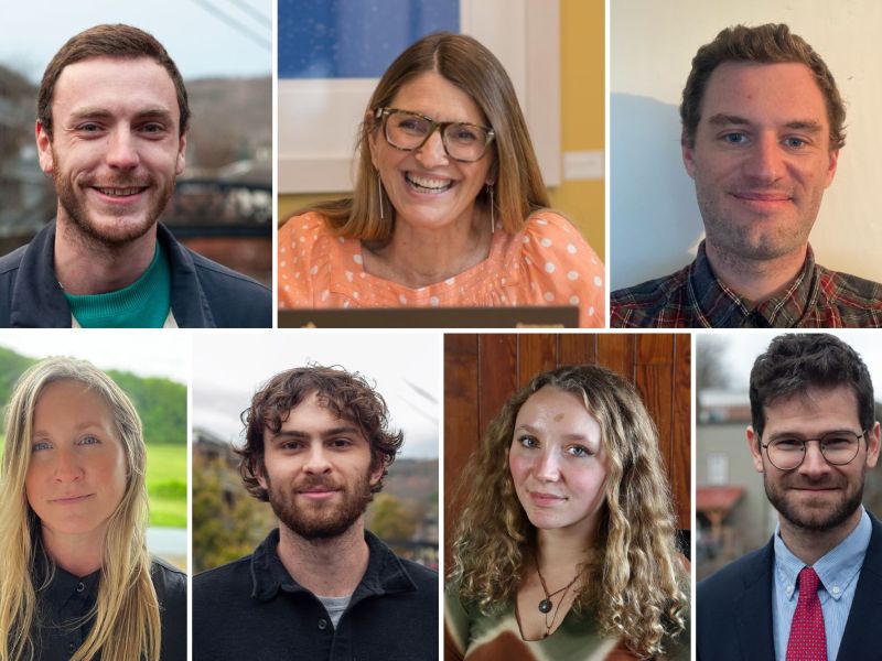 A grid of seven people posing and smiling. Three men are on the top row, one woman is in the center. The bottom row has two men and two women. All are in casual attire.